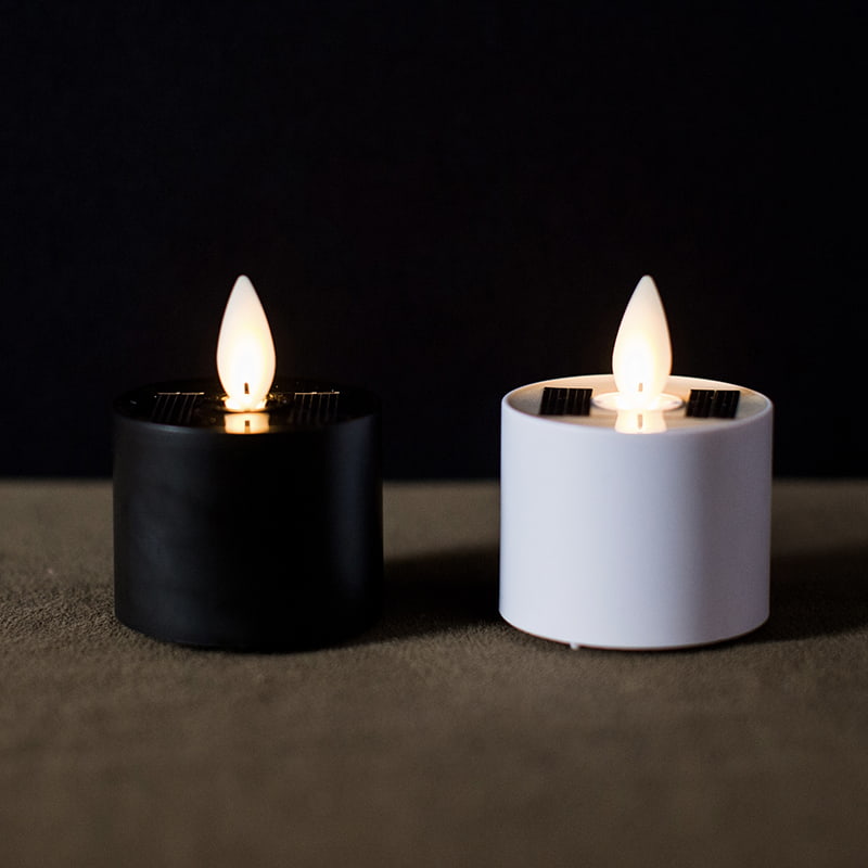 Coinnle Tealight Gan Smál faoi stiúir Gréine